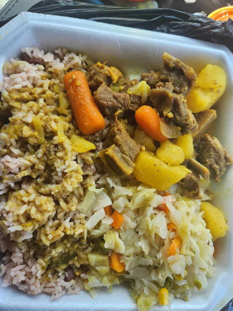 Curry Goat and Rice and Beans