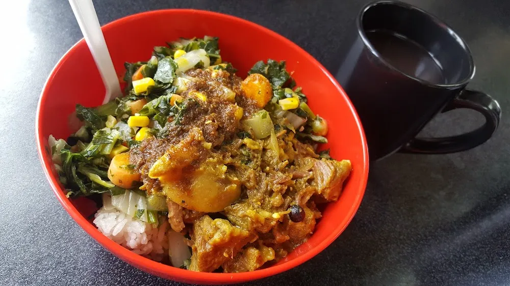 Curry Goat w Collard Greens